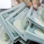 Dólar sobe e fecha perto de R$ 5,15 com aversão a risco